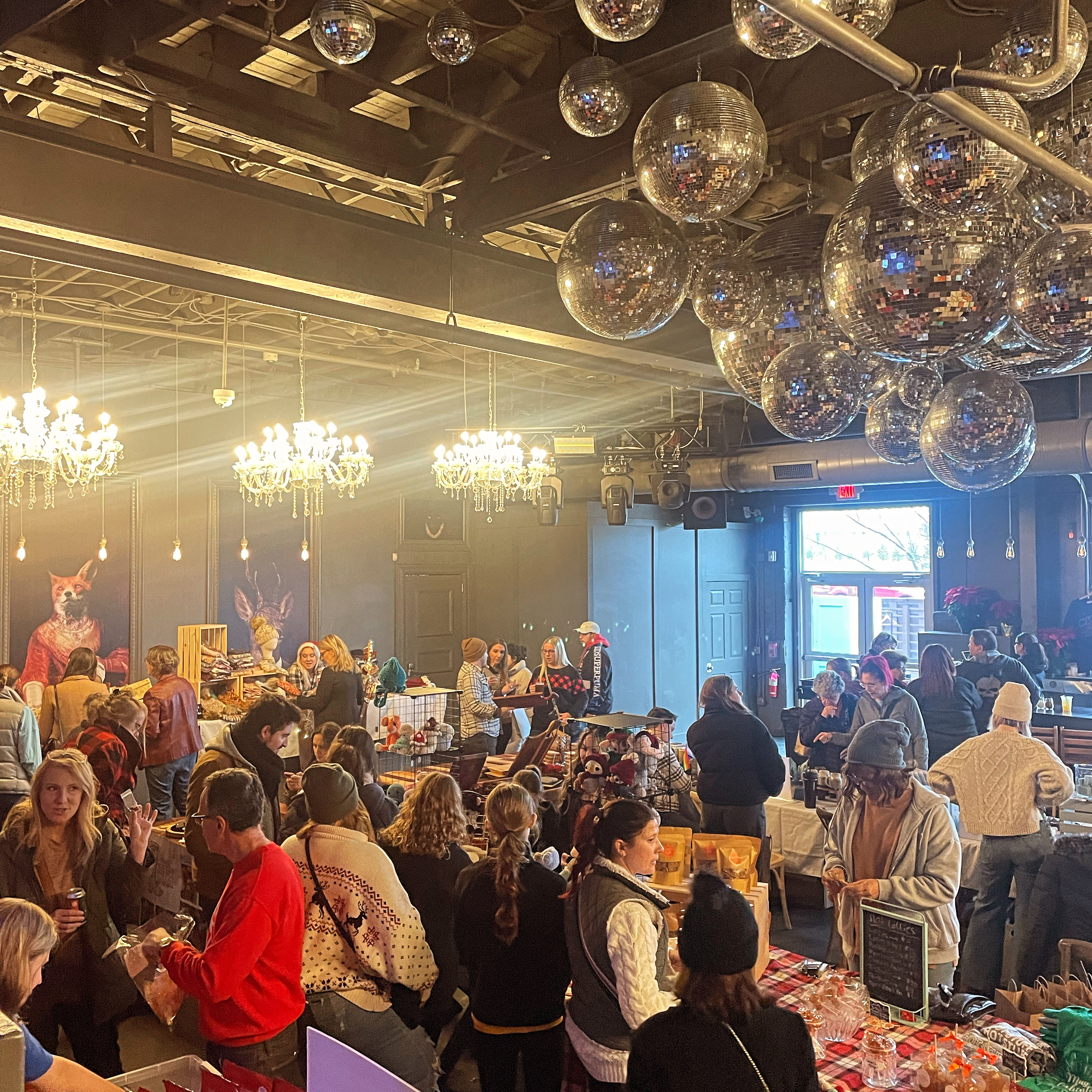 Indoor holiday market with warm lighting